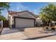 Charming single-Gathering home featuring a spacious driveway and well-manicured landscaping at 2330 E Stephens Pl, Chandler, AZ 85225