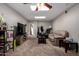 Relaxing living area featuring a TV, seating, and natural light from skylights at 2514 N 22Nd Ave, Phoenix, AZ 85009