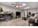 Spacious living room with skylights, carpeted floors, and comfortable seating area at 2514 N 22Nd Ave, Phoenix, AZ 85009