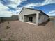 This home has a private gravel backyard and a covered patio perfect for outdoor living at 25183 N 183Rd Dr, Wittmann, AZ 85361