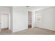 Spacious bedroom features neutral carpet, closet, and abundant natural light at 25183 N 183Rd Dr, Wittmann, AZ 85361
