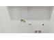 Bright, all-white laundry room setup, prepped and ready for your appliances at 25183 N 183Rd Dr, Wittmann, AZ 85361