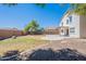Spacious backyard features a covered patio, concrete pad, and low-maintenance desert landscaping at 2847 S 161St Dr, Goodyear, AZ 85338