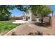 A spacious backyard and patio with a privacy fence at 2847 S 161St Dr, Goodyear, AZ 85338