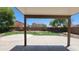 Covered patio offering views of the backyard and fence at 2847 S 161St Dr, Goodyear, AZ 85338