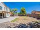 Property has an open backyard space with a patio and desert landscaping at 2847 S 161St Dr, Goodyear, AZ 85338