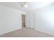 Bedroom with neutral carpet, and doorway that offers entry to the rest of the house at 2847 S 161St Dr, Goodyear, AZ 85338