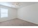 Bedroom features a neutral carpet, and a window that provides plenty of natural light at 2847 S 161St Dr, Goodyear, AZ 85338