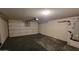 Spacious two-car garage featuring an automatic door and ample space at 2847 S 161St Dr, Goodyear, AZ 85338