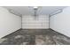 Spacious garage interior, ready for parking and storage solutions at 2847 S 161St Dr, Goodyear, AZ 85338