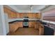 Kitchen with ample counter space and modern appliances at 2847 S 161St Dr, Goodyear, AZ 85338