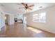 Open living space showcasing tile floors and views into the kitchen and dining areas at 2847 S 161St Dr, Goodyear, AZ 85338
