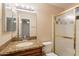 Bathroom featuring granite countertops, large mirror, and shower at 31 W Loma Vista Dr # 102, Tempe, AZ 85282