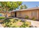 A well-maintained single-story home with a covered carport, and a mature shade tree at 31 W Loma Vista Dr # 102, Tempe, AZ 85282