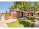Charming single-story home featuring a secure fenced patio and mature shade tree at 31 W Loma Vista Dr # 102, Tempe, AZ 85282