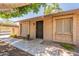 A home featuring an inviting front door with desert landscaping and a covered carport at 31 W Loma Vista Dr # 102, Tempe, AZ 85282