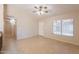 Inviting space with tile floors, neutral walls, a window, and easy access to the kitchen and front door at 31 W Loma Vista Dr # 102, Tempe, AZ 85282