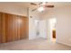 Main bedroom with large closet leads into ensuite bath at 31 W Loma Vista Dr # 102, Tempe, AZ 85282