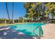 Large community swimming pool with clear water and surrounding greenery, and lounge chairs at 31 W Loma Vista Dr # 102, Tempe, AZ 85282