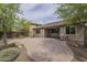 Backyard featuring desert landscaping, a stone patio, a grill and an open view of the home at 3721 W Aracely Dr, New River, AZ 85087