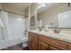 Traditional bathroom featuring double vanity, framed mirror, and tub shower combo at 3721 W Aracely Dr, New River, AZ 85087