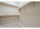 Walk-in closet with carpeted floor and metal rods and shelves at 3721 W Aracely Dr, New River, AZ 85087