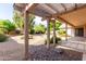 Backyard patio area with a pergola and views of the landscaped yard at 3740 W Kent Dr, Chandler, AZ 85226