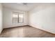 Bedroom with tile floors and a window, creating a bright and inviting space at 3740 W Kent Dr, Chandler, AZ 85226