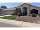 Charming home exterior with desert landscaping, mature trees, and a two-car garage at 3740 W Kent Dr, Chandler, AZ 85226
