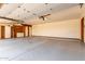 Spacious garage with built-in storage and ample room for multiple vehicles at 3740 W Kent Dr, Chandler, AZ 85226