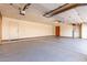 Clean and spacious garage with multiple access doors and high ceilings at 3740 W Kent Dr, Chandler, AZ 85226