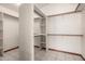 Bright walk-in closet with built-in shelving and ample storage space at 3740 W Kent Dr, Chandler, AZ 85226