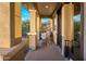 Comfortable balcony with seating area, overlooking surrounding neighborhood, and natural light at 3741 E Ember Glow Way, Phoenix, AZ 85050