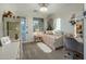 Bedroom featuring a daybed, soft decor, and natural light at 3741 E Ember Glow Way, Phoenix, AZ 85050
