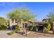 Beautiful home with manicured landscaping, a spacious driveway, and charming architectural details at 3741 E Ember Glow Way, Phoenix, AZ 85050
