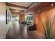 Inviting lounge area with comfortable seating, wood accents, and natural light creating a relaxed atmosphere at 3741 E Ember Glow Way, Phoenix, AZ 85050