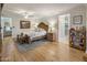 Spacious main bedroom boasts hardwood floors, a sitting area, and ensuite bath at 3741 E Ember Glow Way, Phoenix, AZ 85050