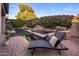 Sparkling pool and spa area features a lounge chair, and mature landscaping at 3741 E Ember Glow Way, Phoenix, AZ 85050