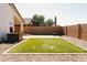 Wonderful backyard featuring a patch of turf at 3756 E Alamo St, San Tan Valley, AZ 85140