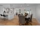 Inviting dining room featuring hardwood floors and an open kitchen area at 4018 E Coolidge St, Phoenix, AZ 85018