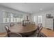 Formal dining room features a wooden table, decor, and natural light at 4018 E Coolidge St, Phoenix, AZ 85018