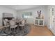 Formal dining room features a wooden table, decor, and natural light at 4018 E Coolidge St, Phoenix, AZ 85018