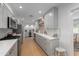 Bright kitchen features gray cabinets, stainless steel appliances, and wood floors at 4018 E Coolidge St, Phoenix, AZ 85018