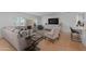 Elegant living room features hardwood floors, a large sofa, and ample seating at 4018 E Coolidge St, Phoenix, AZ 85018