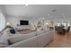 Spacious open-concept living room and dining area with hardwood floors at 4018 E Coolidge St, Phoenix, AZ 85018