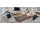 Cozy living room boasts hardwood floors and built-in shelving for storage at 4018 E Coolidge St, Phoenix, AZ 85018