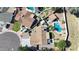 Aerial view of the property showcasing a backyard oasis with a pool, patio, and lush landscaping at 4126 E Windrose Dr, Phoenix, AZ 85032