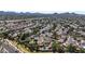 Panoramic aerial view of a residential neighborhood featuring lush landscaping, pools, and mountain views at 4126 E Windrose Dr, Phoenix, AZ 85032