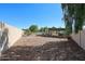 Spacious backyard featuring a refreshing pool, covered patio, and plenty of space for recreation at 4126 E Windrose Dr, Phoenix, AZ 85032