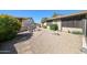 Cozy backyard patio featuring outdoor seating, desert landscaping, and decorative accents at 4126 E Windrose Dr, Phoenix, AZ 85032